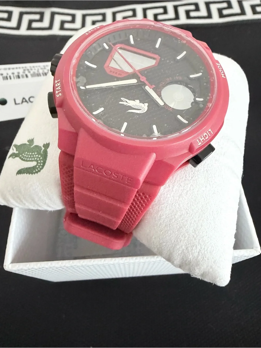 Brand new Lacoste Unisex Analog & Digital Watch in red with black dial.